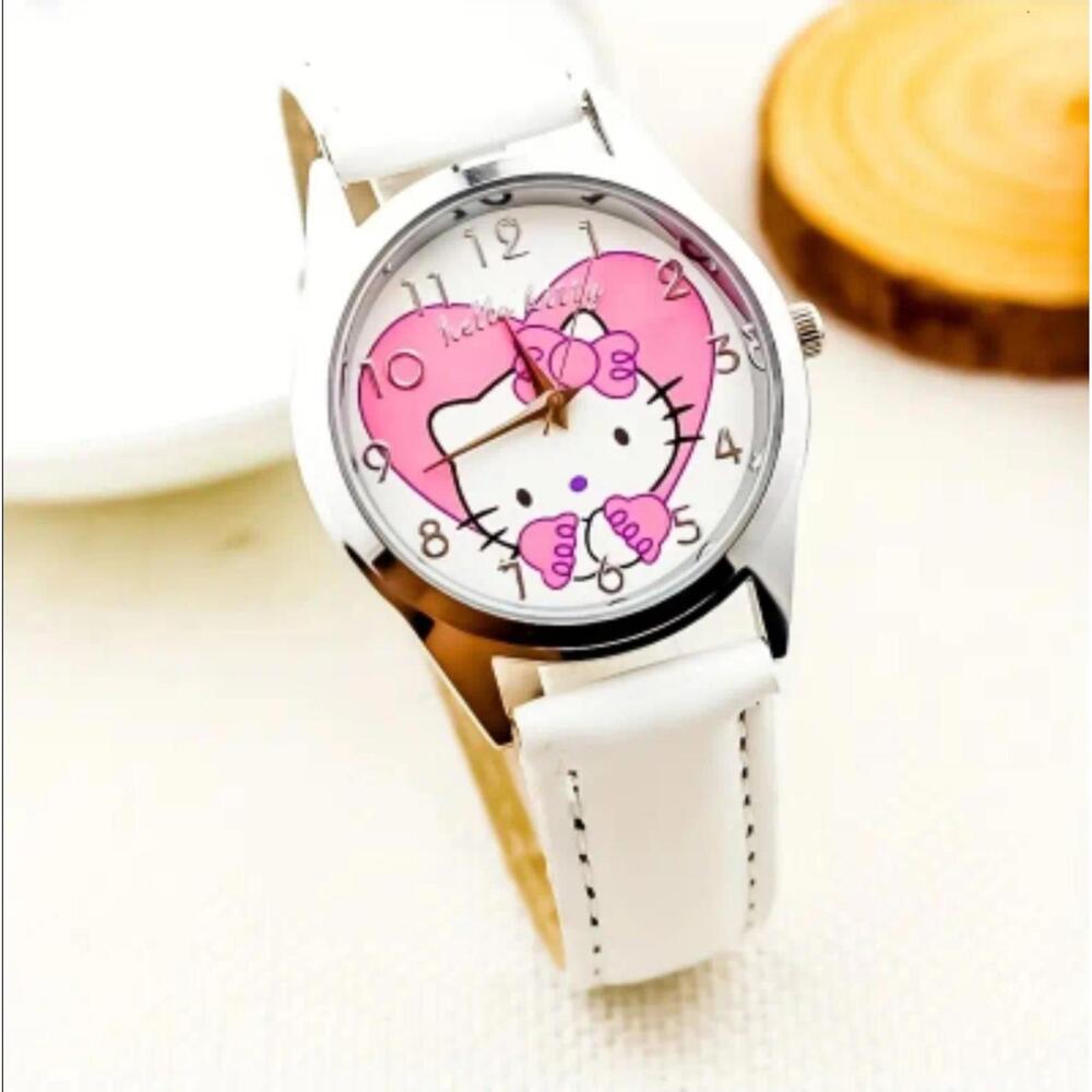 Beautiful Hello Kitty white watch ( free gift. Pendant)